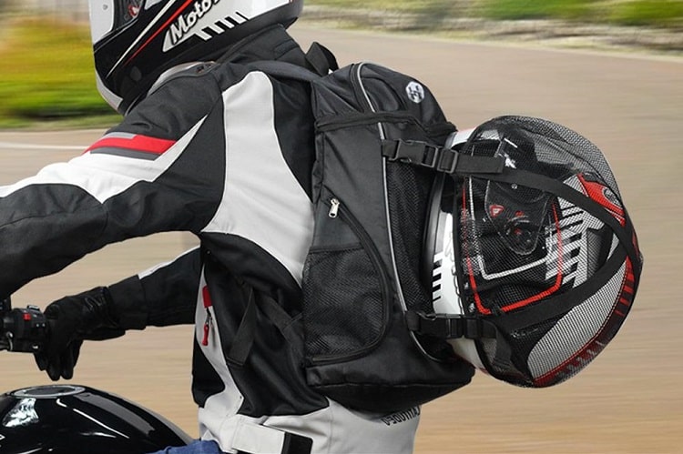 How to strap helmet on backpack?