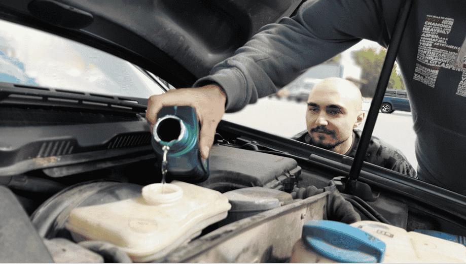 how to put coolant in car