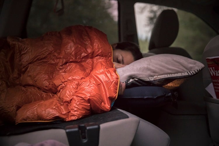 What makes sleeping in a car illegal